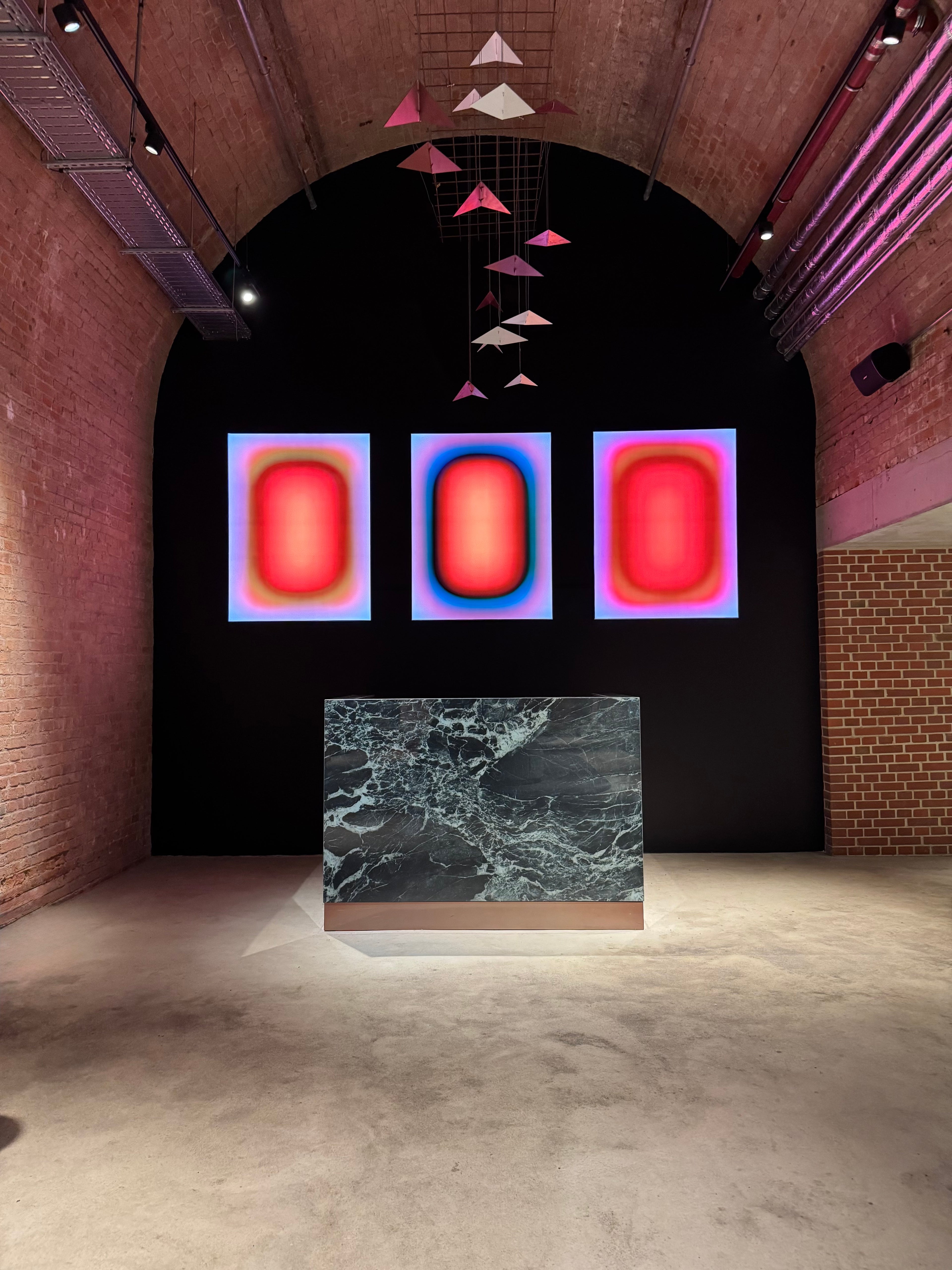 Installation of three PILL lightboxes by Luis West in the brick vault at John Reed Bötzow in Berlin