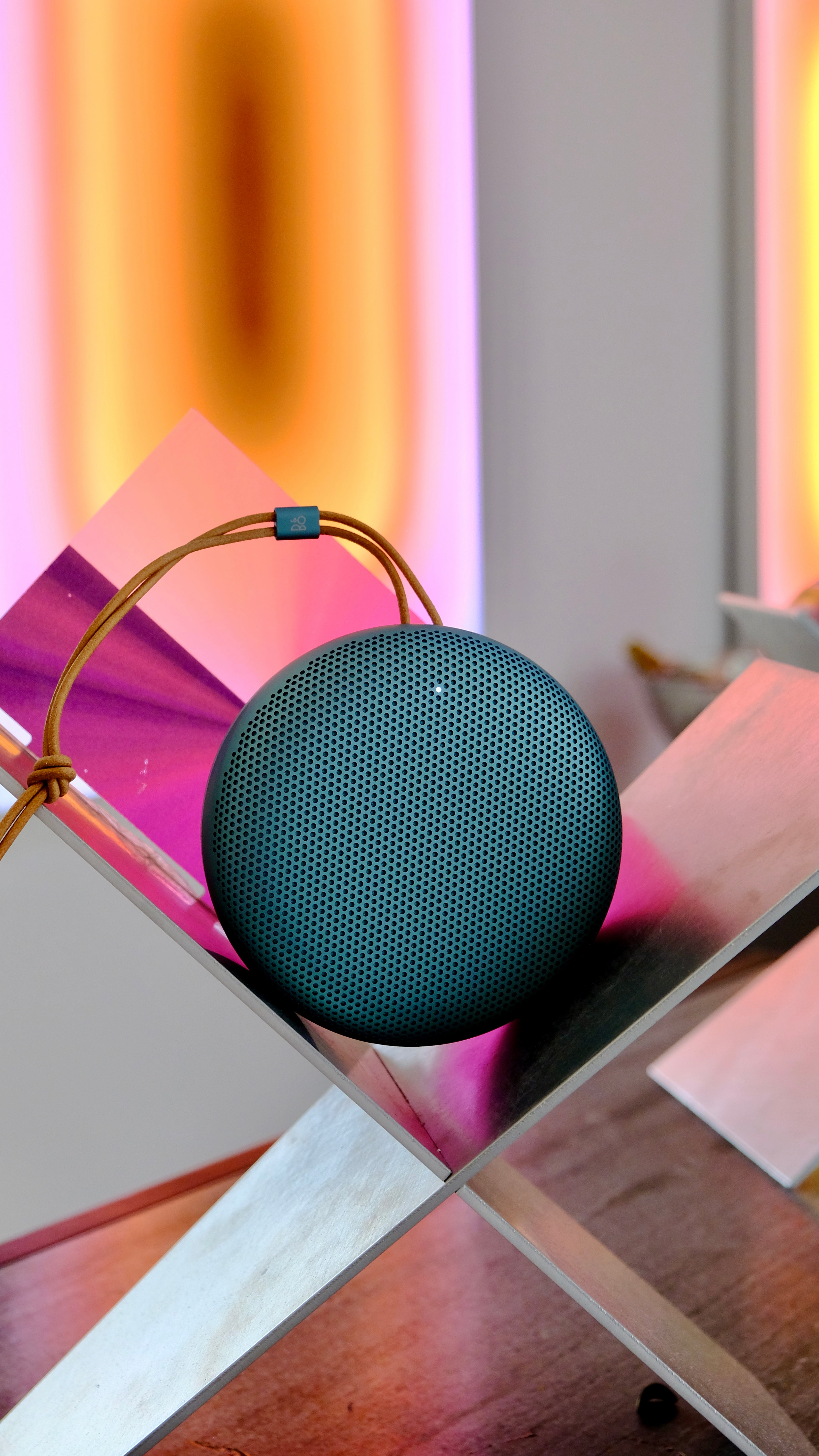 A Bang & Olufsen product photographed alongside a Luis West artwork