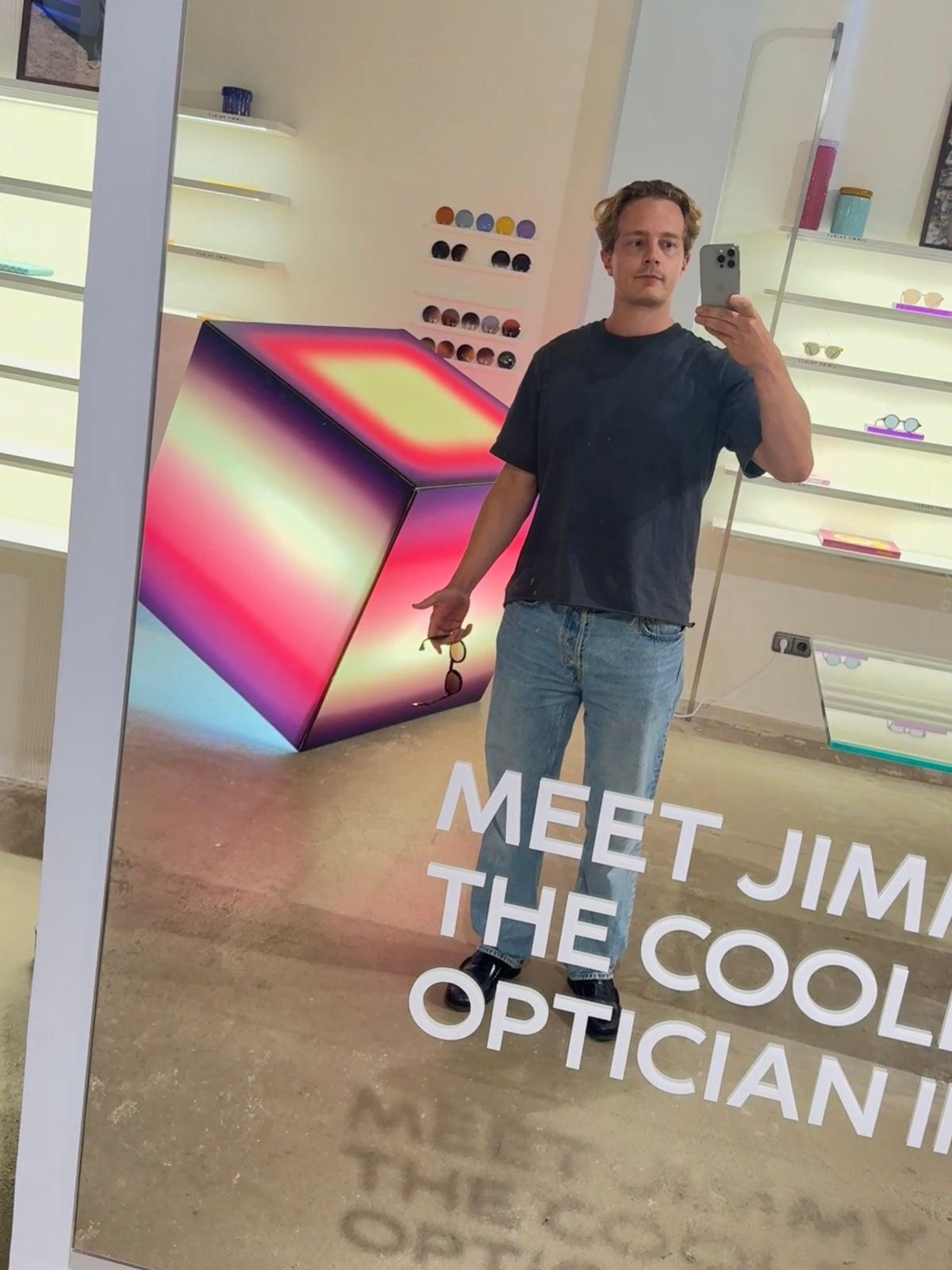 Luis West beside a lightbox at the Jimmy Fairly store in Hamburg