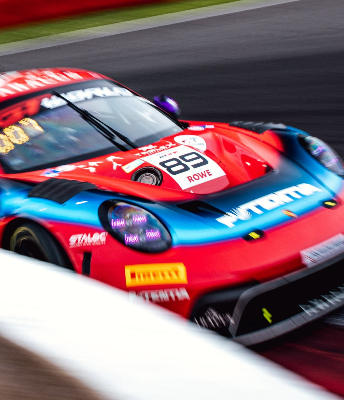 The Porsche 911 GT3 R in the Luis West livery on track at the 24 Hours of Spa 2026