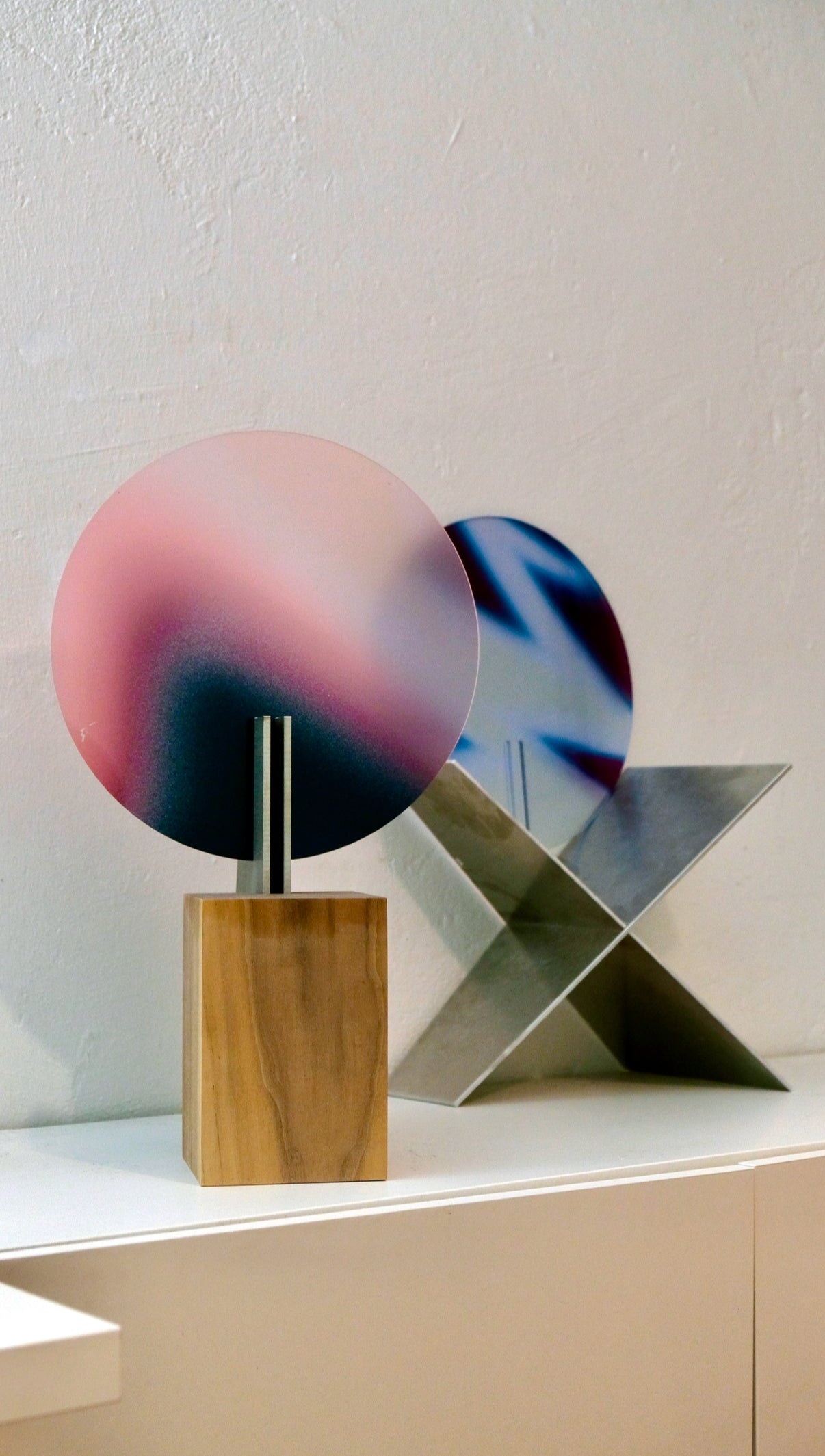 CANDLE HOLDER by Luis West — solid wood, a metal pin and a milled acrylic disc carrying a gradient