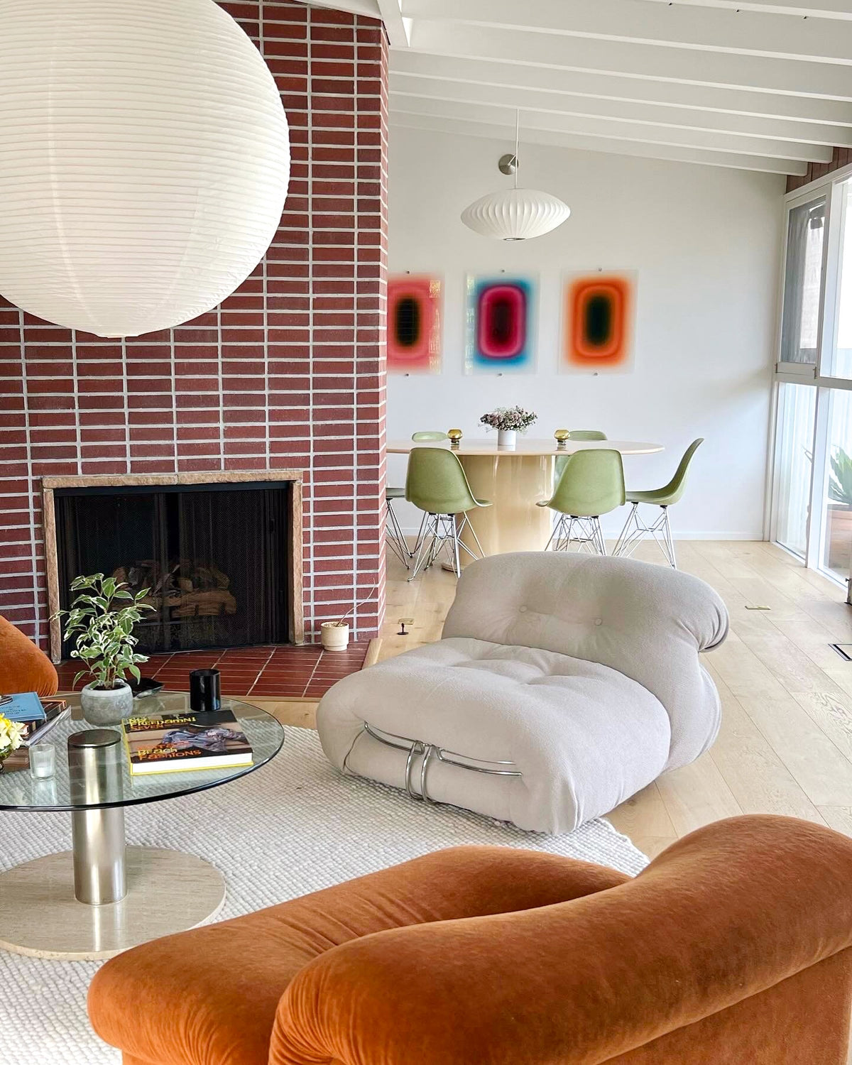 Three PILL artworks by Luis West in a mid-century living room in Los Angeles
